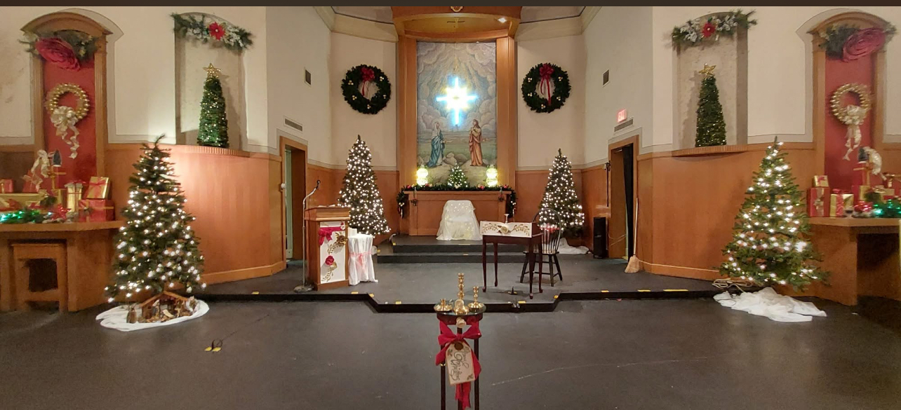 Festival of Lessons and Carols — 2025, Catherine Kelly Auditorium decorated for Christmas
