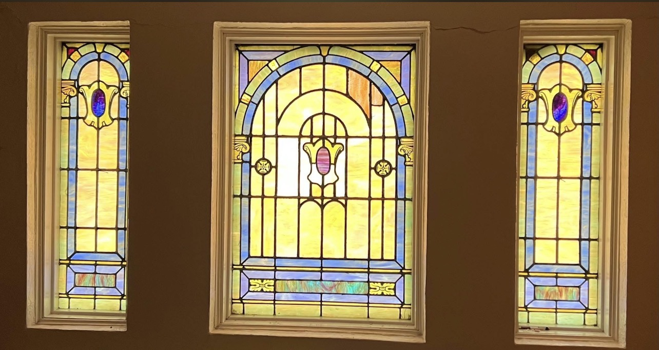 Historic stained-glass window preserved at the Rose Garden Center for the Arts