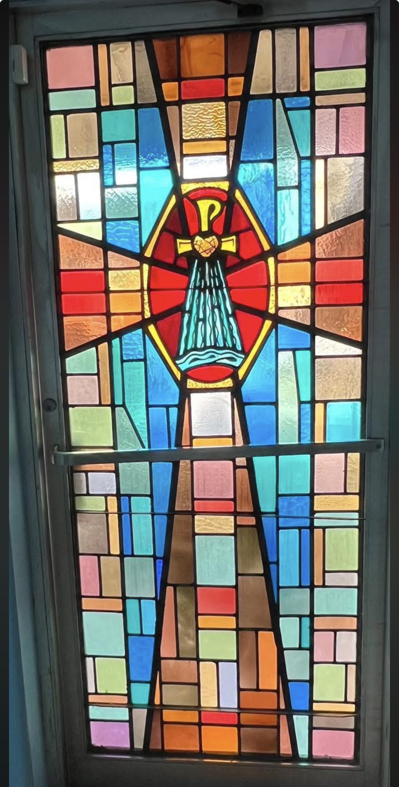 Historic stained-glass window preserved at the Rose Garden Center for the Arts